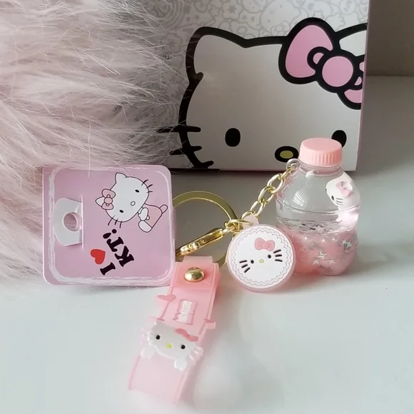 Hello Kitty Key Chain Floating Oil Liquid Acrylic Bottle Key Chain New - Picture 2 of 10
